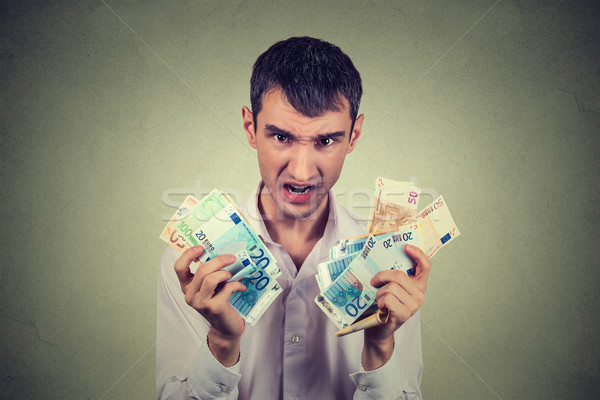 Açgözlü adam euro yalıtılmış Stok fotoğraf © ichiosea