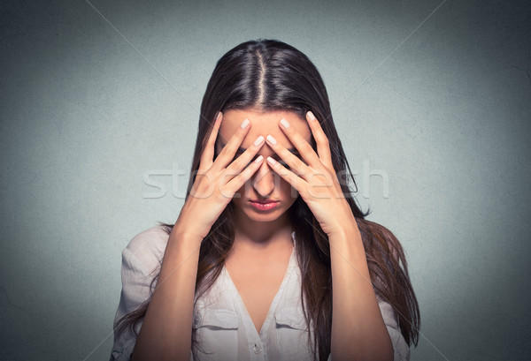sad young woman with worried stressed face expression  Stock photo © ichiosea