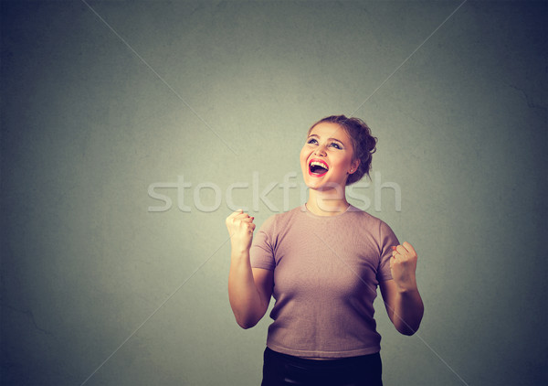 Stock photo: happy successful student, woman winning, fists pumped celebrating success