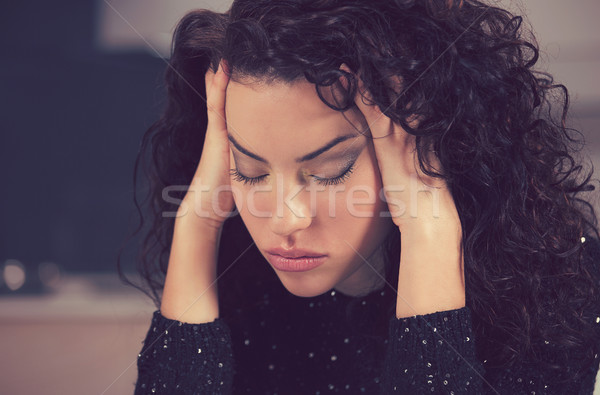 Stressed sad young housewife sitting in modern kitchen Stock photo © ichiosea