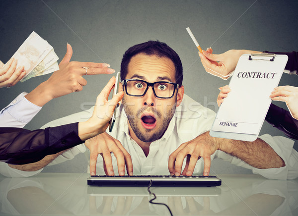 Stressed business man in office working on computer overwhelmed  Stock photo © ichiosea