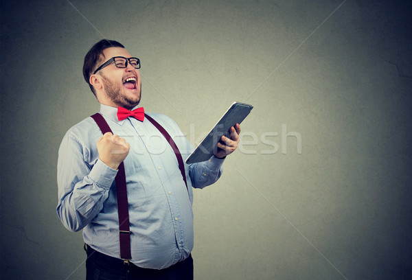 Successful man excited with success Stock photo © ichiosea