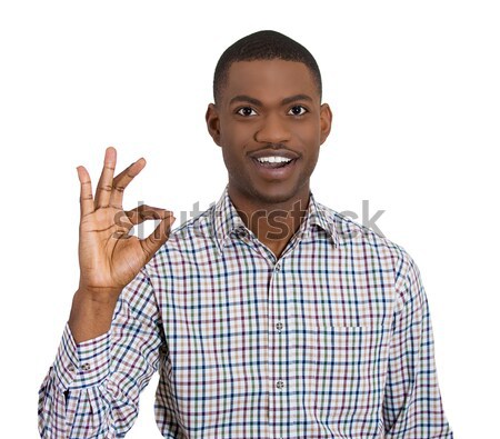Stock photo: smiling man giving OK sign