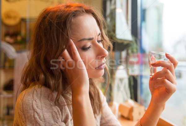 Depresso ragazza ubriaco sola bar vista laterale Foto d'archivio © ichiosea