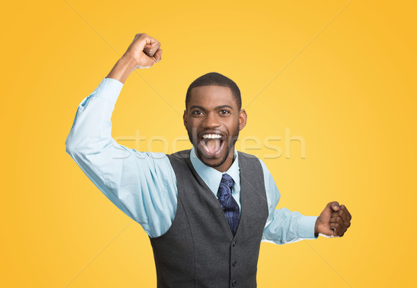 Excited happy man celebrates success, good outcome Stock photo © ichiosea