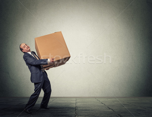Man carrying large heavy box Stock photo © ichiosea