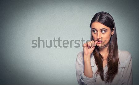 Young beautiful frustrated angry woman with fist up in air  Stock photo © ichiosea