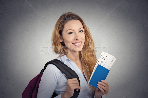 happy tourist young woman holding passport holiday flight ticket  Stock photo © ichiosea