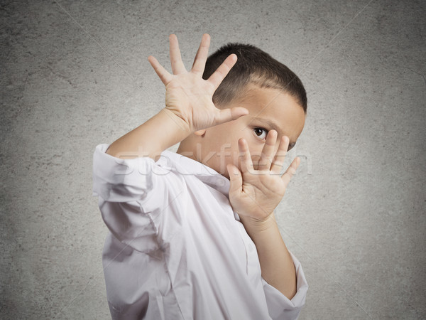 child boy looking scared trying to protect himself Stock photo © ichiosea