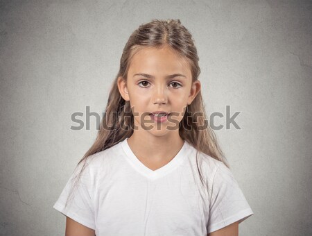 grumpy skeptical blonde woman isolated on gray background Stock photo © ichiosea