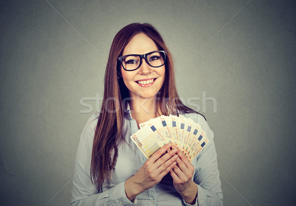 молодые деловой женщины деньги женщину счастливым Сток-фото © ichiosea
