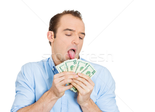 Greedy man licking cash Stock photo © ichiosea