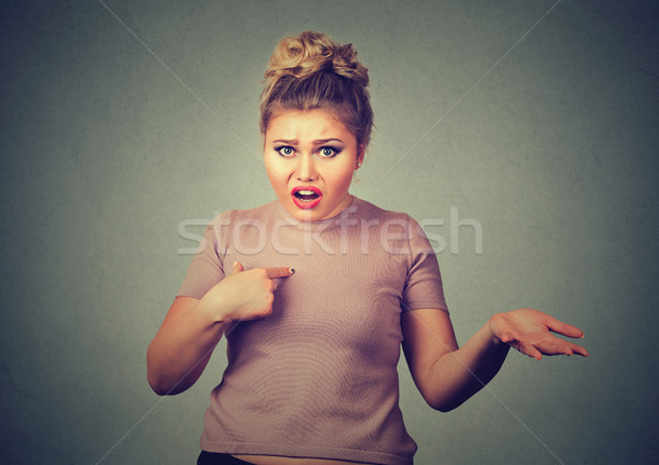 angry, annoyed woman, getting mad, asking you talking to me, you mean me? Stock photo © ichiosea