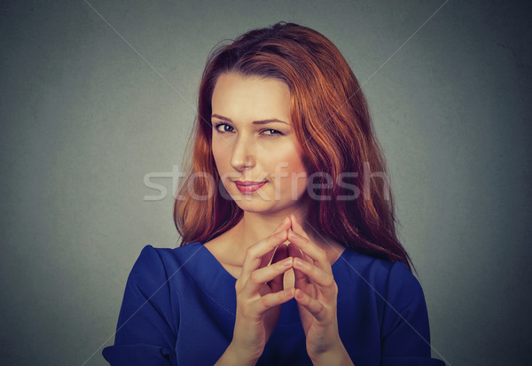 Ravasz fiatal nő valami közelkép portré izolált Stock fotó © ichiosea