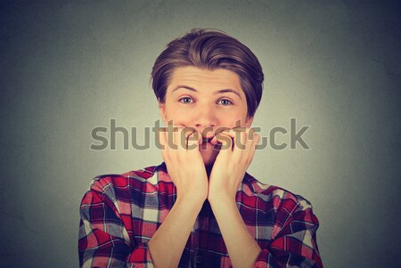 Anxious stressed young man looking at camera Stock photo © ichiosea