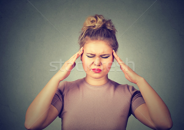 Triste mulher jovem preocupado cara olhando para baixo Foto stock © ichiosea