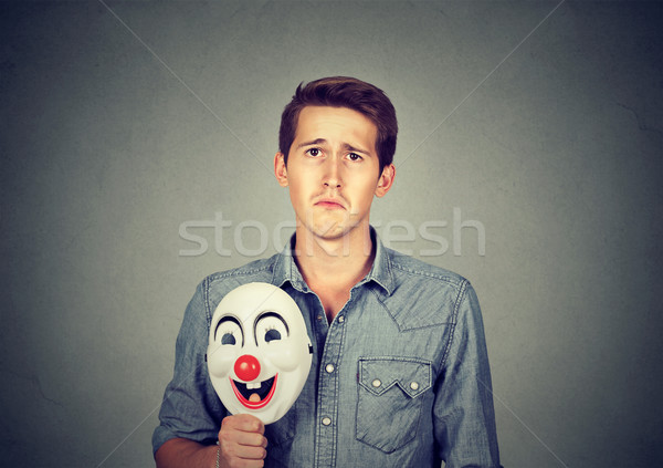 [[stock_photo]]: Jeunes · triste · homme · heureux · clown · masque