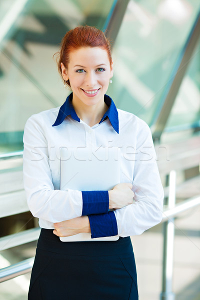 Young corporate employee standing in hallway Stock photo © ichiosea
