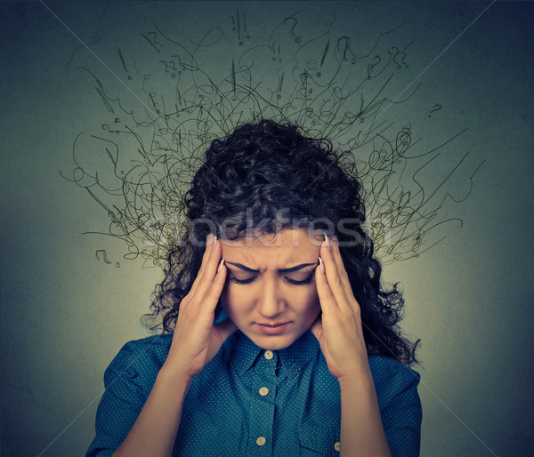 woman worried stressed face expression brain melting into lines question marks Stock photo © ichiosea