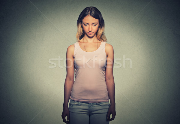 Sad shy insecure young woman Stock photo © ichiosea