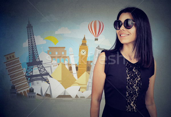beautiful woman with sunglasses ready to travel around the world   Stock photo © ichiosea