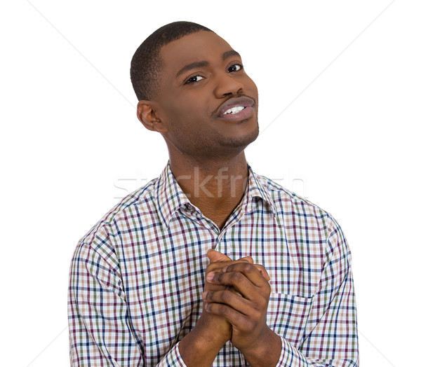 Stock photo: man with clasped hands pleading 