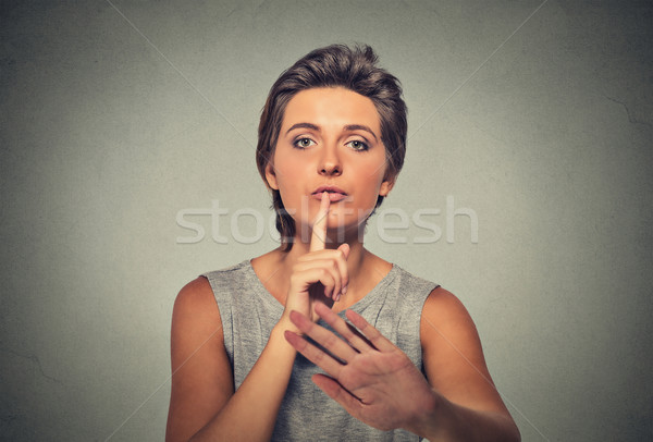 serious upset woman finger, hand on lips, shhh gesture asking be quiet silence Stock photo © ichiosea