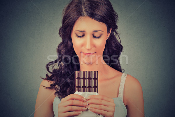 young woman tired of diet restrictions craving sweets chocolate  Stock photo © ichiosea