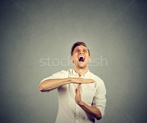 man showing time out hand gesture screaming to stop Stock photo © ichiosea
