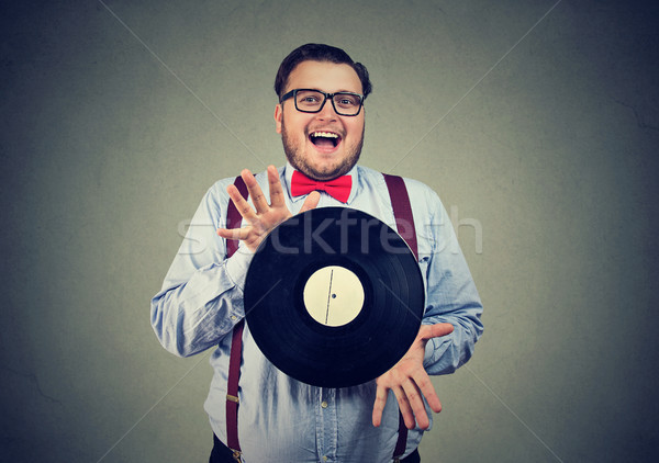 Különc férfi izgatott bakelit lemez pufók Stock fotó © ichiosea