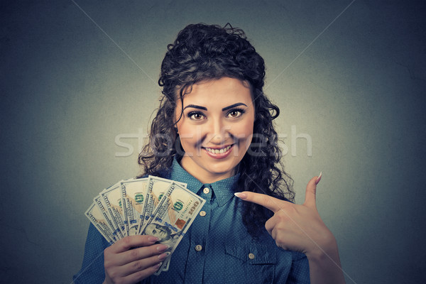 happy excited successful young business woman holding money dollar bills Stock photo © ichiosea