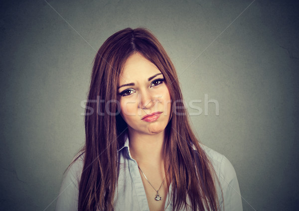 Portré bosszús ingerült fiatal nő izolált szürke Stock fotó © ichiosea