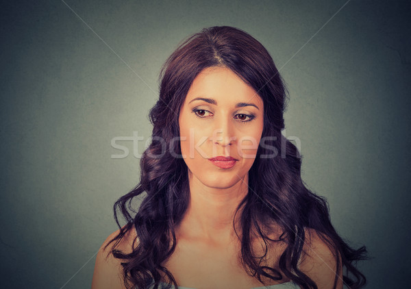 confused skeptical woman thinking about past Stock photo © ichiosea