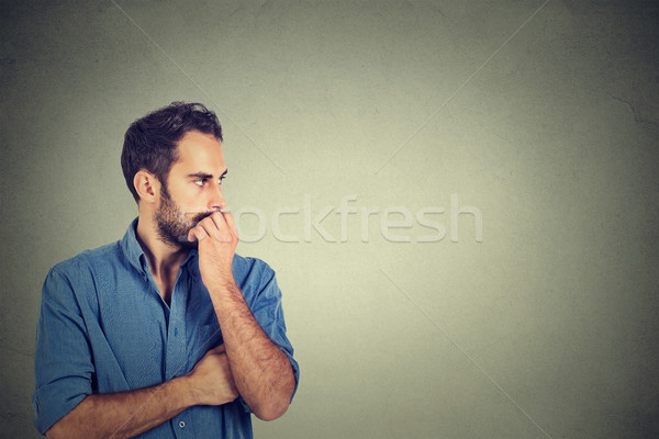 Preoccupied anxious young man Stock photo © ichiosea