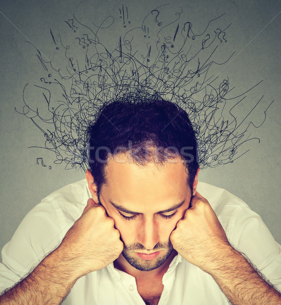 Sad man with stressed face expression brain melting into lines  Stock photo © ichiosea