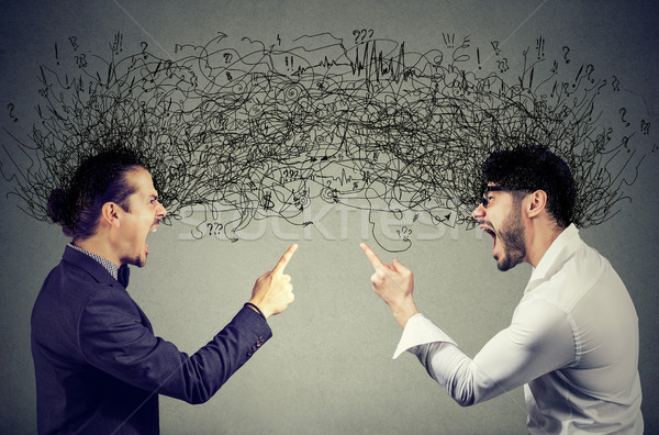 Angry men screaming at each other exchanging with negative thoughts  Stock photo © ichiosea