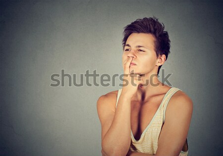 Preoccupied thinking young man looking up Stock photo © ichiosea