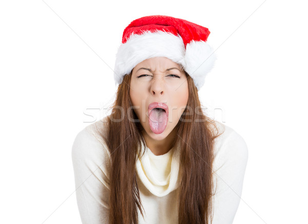 Unhappy, angry, christmas woman sticking out her tongue Stock photo © ichiosea