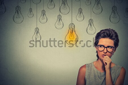 Gondolkodik nő szemüveg felfelé néz fény ötlet Stock fotó © ichiosea