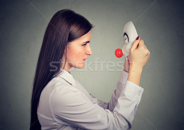 [[stock_photo]]: Sérieux · bouleversé · femme · regarder · heureux · clown