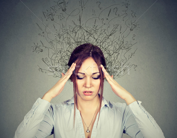 woman with worried stressed face expression brain melting into lines  Stock photo © ichiosea