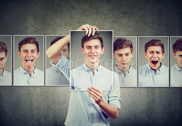 Masked man teenager expressing different emotions face expressions  Stock photo © ichiosea