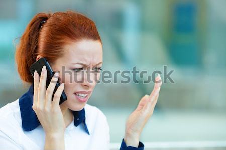 Verärgert Frau unangenehme Gespräch Telefon Stock foto © ichiosea