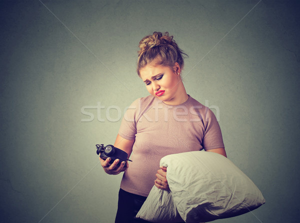 beautiful sleepy woman with a pillow in hand Stock photo © ichiosea