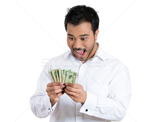 happy man holding cash Stock photo © ichiosea