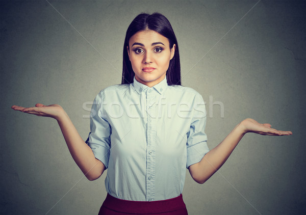 Woman with arms out shrugs shoulders so what I don't know Stock photo © ichiosea