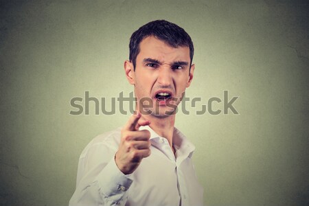 disgusted man with finger in mouth displeased ready to throw up Stock photo © ichiosea