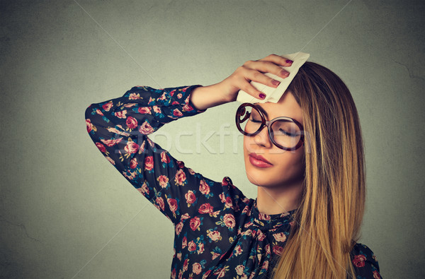 tired woman stressed sweating having headache  Stock photo © ichiosea