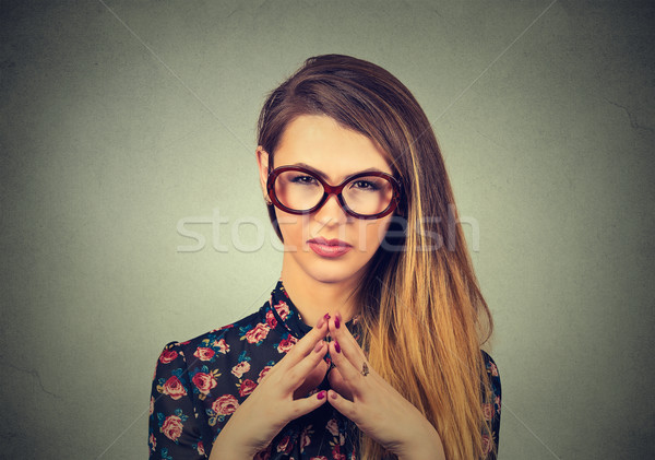 Ravasz fiatal nő szemüveg valami közelkép portré Stock fotó © ichiosea