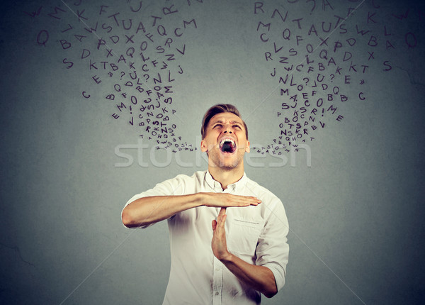 man showing time out screaming letters coming out of mouth  Stock photo © ichiosea